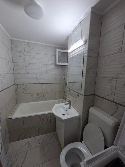 Garsonieră decomandată în Central