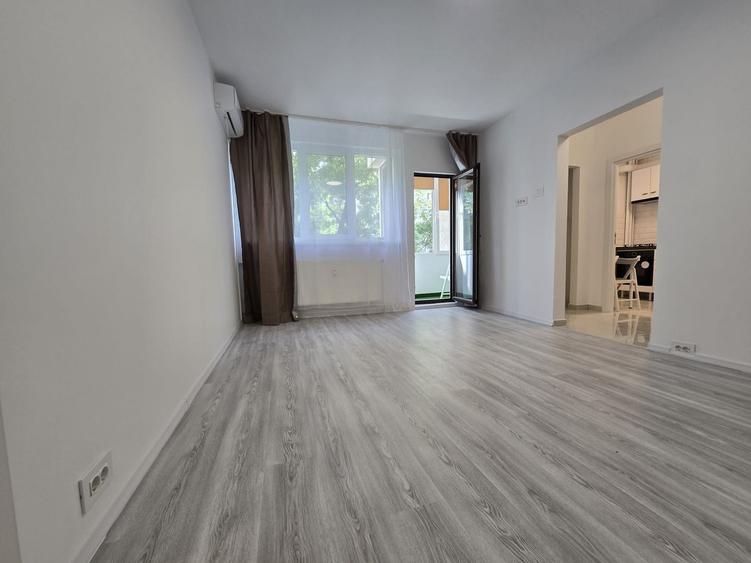 Apartament cu 2 camere semidecomandat, mobilat în 1 Mai