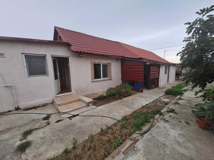 Casă cu 4 camere în Palazu Mare