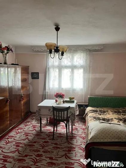 Casă cu 2 camere cu Teren 714 Mp în Siret