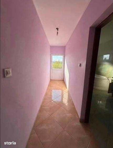 Casă cu 4 camere cu Teren 1100 Mp în Central