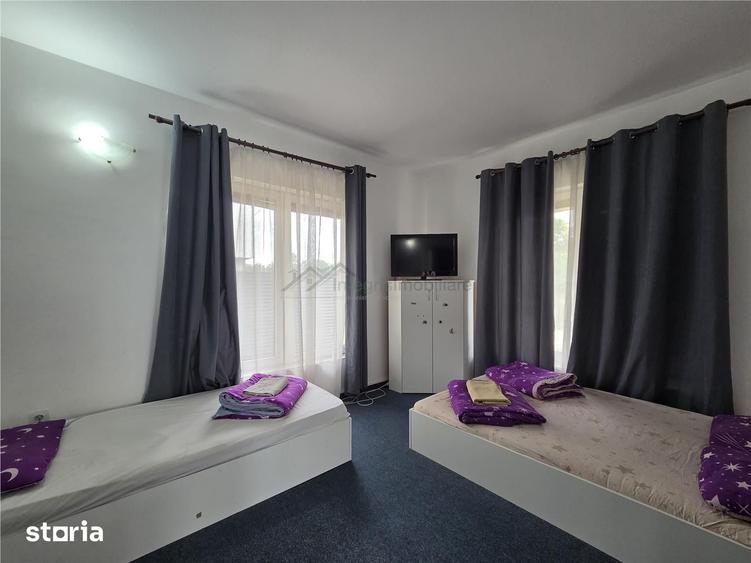Casă cu 10 camere cu Teren 300 Mp în Sânmartin