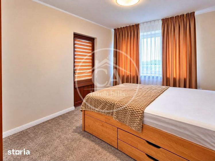 Apartament cu 5 camere decomandat în Sânmartin