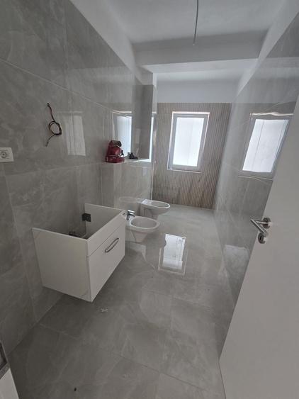 Apartament cu 2 camere semidecomandat în Moșnița Nouă