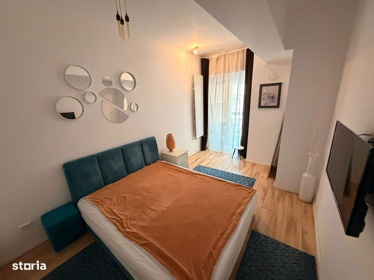 Apartament cu 2 camere semidecomandat, mobilat în P-ța Alba Iulia