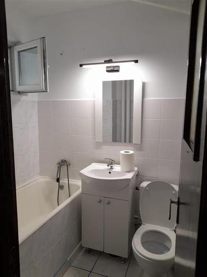 Apartament cu 2 camere semidecomandat, mobilat în Podu Roș
