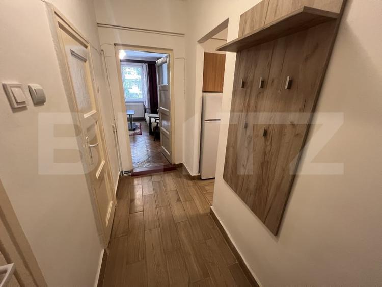 Apartament cu 2 camere semidecomandat, mobilat în Central