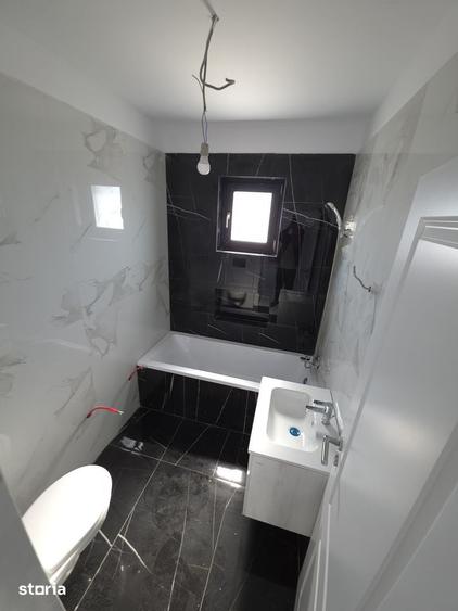 Casă cu 4 camere cu Teren 400 Mp în Clinceni