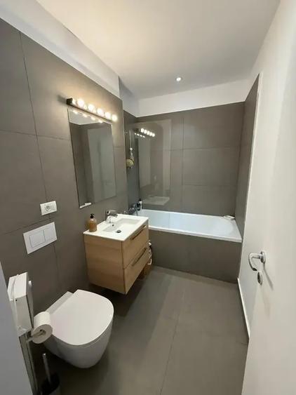 Apartament cu 3 camere semidecomandat, mobilat în Exterior Nord