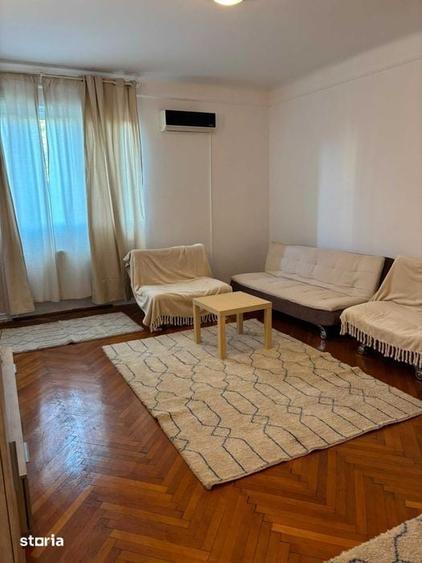 Apartament cu 3 camere semidecomandat în Romană