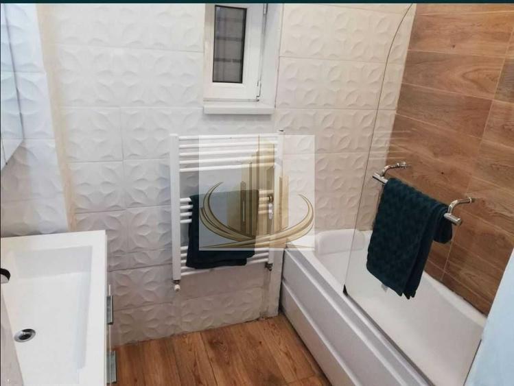 Apartament cu 3 camere semidecomandat în Traian