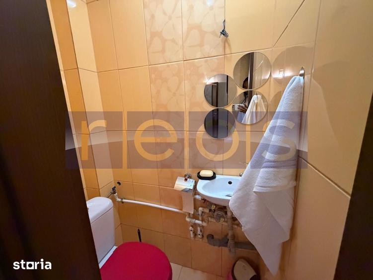 Apartament cu 3 camere în Romană