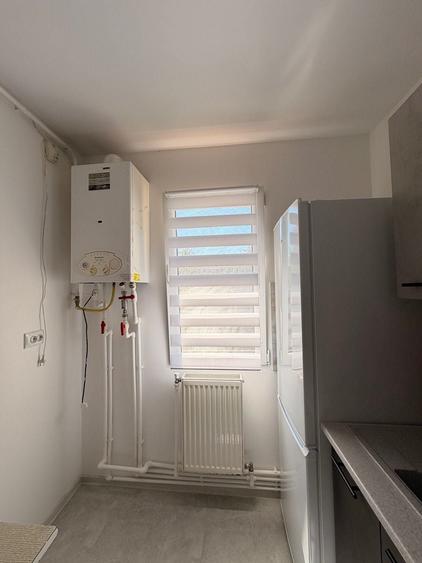 Apartament cu 2 camere semidecomandat în Podu Roș