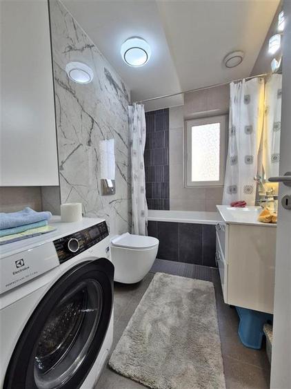 Apartament cu 2 camere decomandat, mobilat în Tractorul