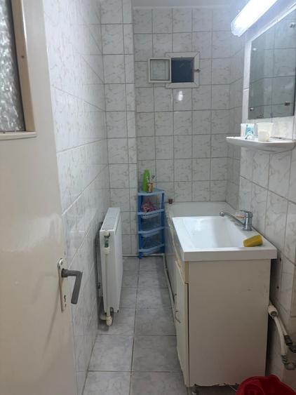 Apartament cu 3 camere decomandat în Căpățânești