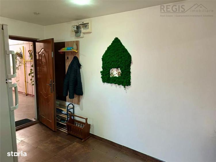 Apartament cu 3 camere decomandat în Tractorul