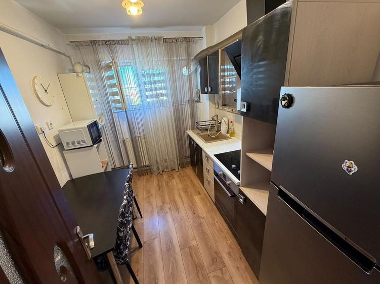 Apartament cu 2 camere semidecomandat, mobilat în Central