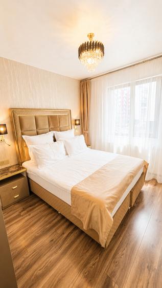Apartament cu 4 camere decomandat, mobilat în Tractorul