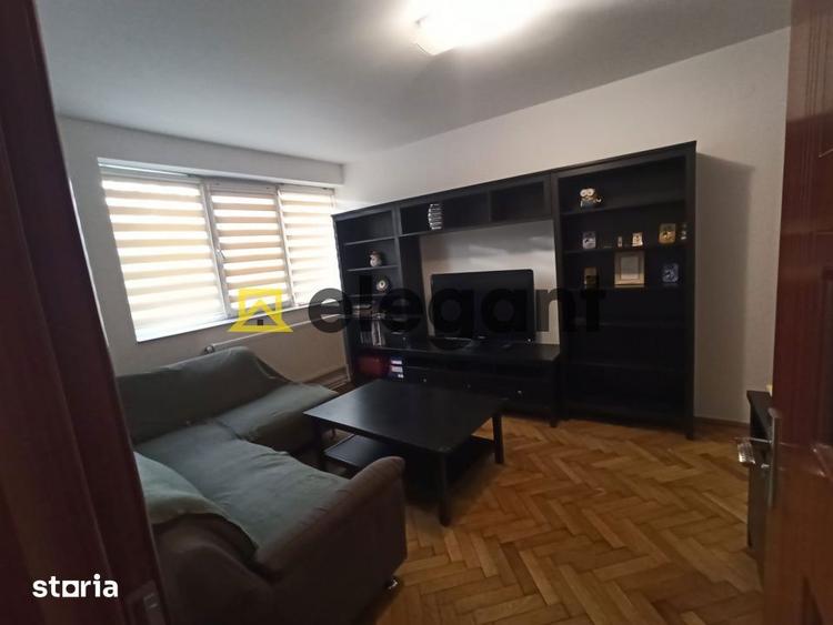Apartament cu 3 camere semidecomandat, mobilat în Calea București