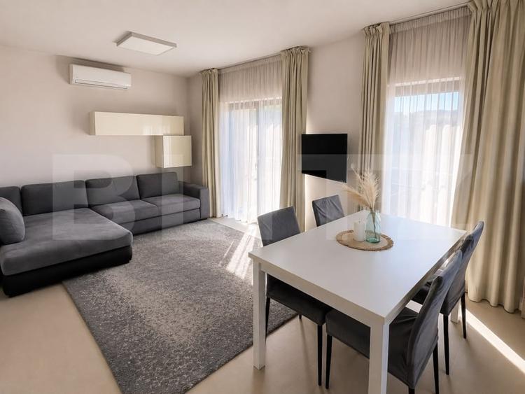 Apartament cu 3 camere semidecomandat, mobilat în Borhanci