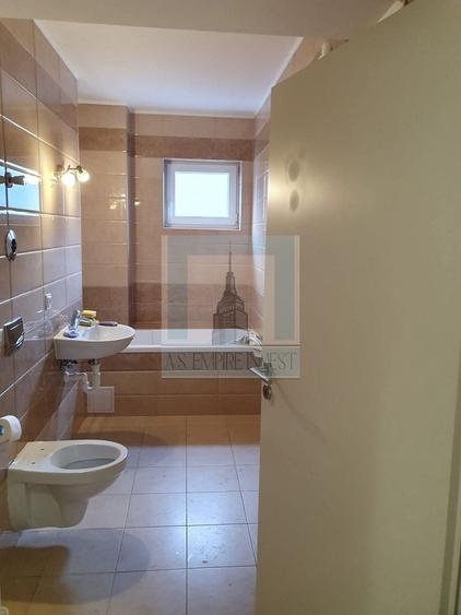 Apartament cu 2 camere decomandat în Tractorul
