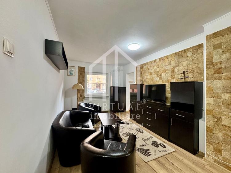 Apartament cu 3 camere semidecomandat, mobilat în Central