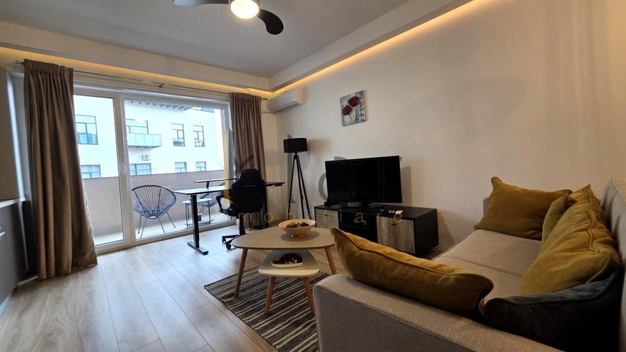 Apartament cu 2 camere semidecomandat, mobilat în Central