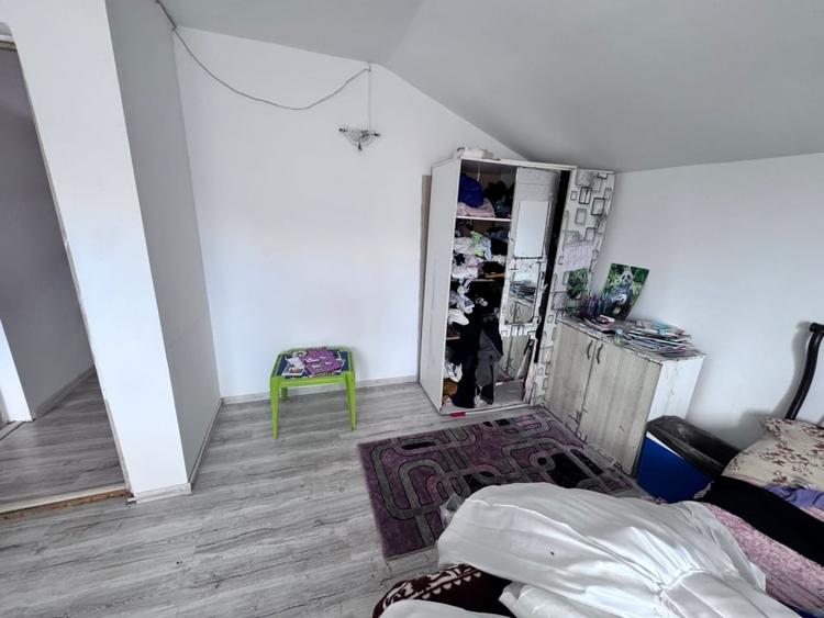 Casă individuală cu 4 camere cu Teren 120 Mp în Central