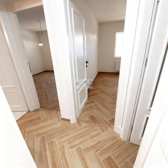 Apartament cu 4 camere decomandat în Străoane