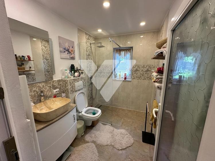 Casă individuală cu 4 camere cu Canalizare în Cisnădioara