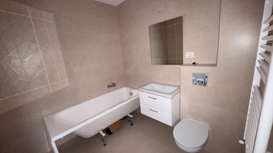 Apartament cu 3 camere decomandat în 2 Moldoveni