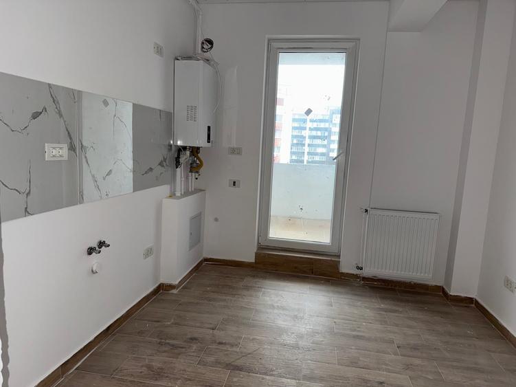 Apartament cu 3 camere decomandat în Popești-Leordeni — fotografia 1
