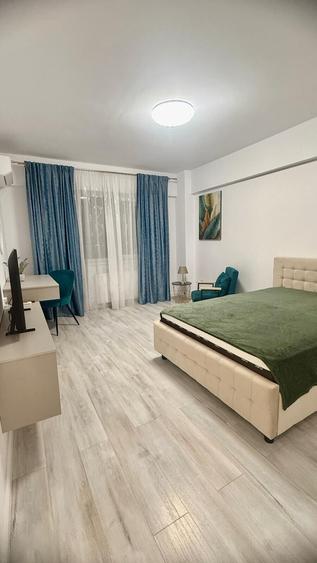Garsonieră decomandată, mobilată în Podu Roș