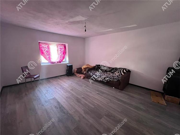 Casă individuală cu 5 camere cu Teren 489 Mp în Central
