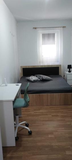 Apartament 2 camere, bucatarie open space, camera, dressing, baie. Modern si utilat