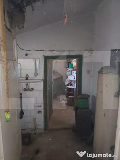 Casă cu 2 camere cu Teren 1426 Mp în Central