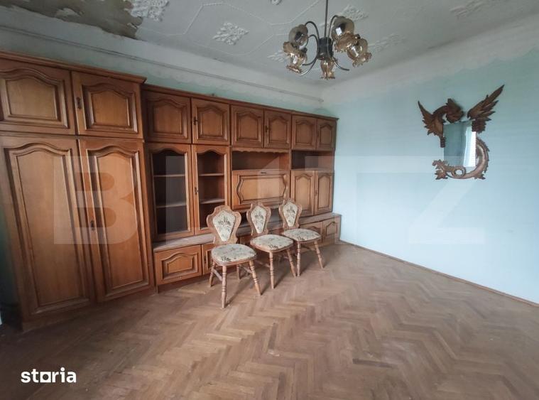 Casă cu 4 camere cu Teren 1100 Mp în Central