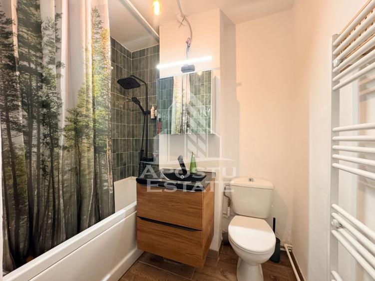 Apartament cu 2 camere semidecomandat, mobilat în Central