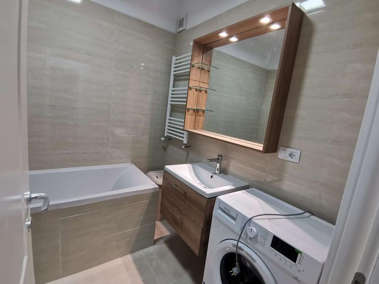 Apartament cu 2 camere semidecomandat, mobilat în Bucium