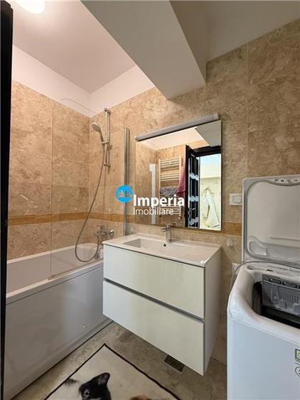 Apartament cu 2 camere decomandat în Podul de Fier