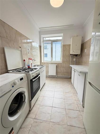 Apartament cu 2 camere semidecomandat în Podu Roș