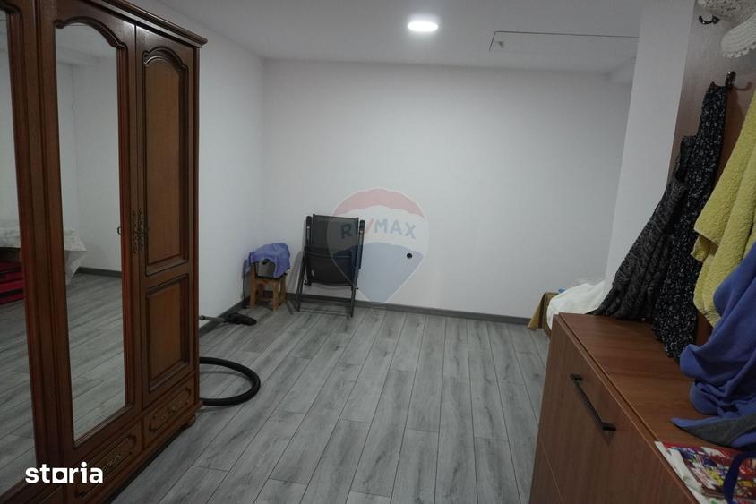 Casă cu 4 camere cu Teren 900 Mp în Central