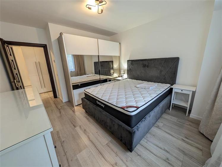 Bloc nou - langa Universitatea Bacovia - chirie 2 camere - mobilat si utilat com - 11