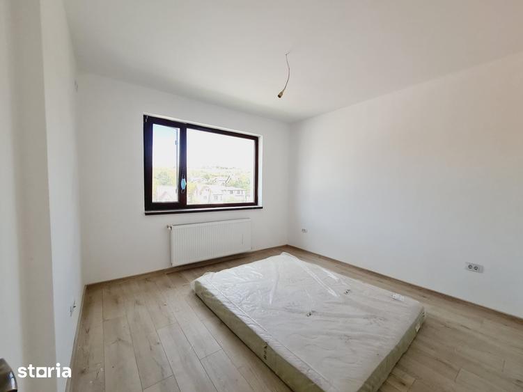 Casă cu 5 camere cu Teren 500 Mp în Bucium