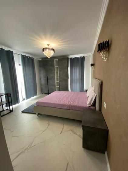 Apartament cu 4 camere decomandat, mobilat în Exterior Est