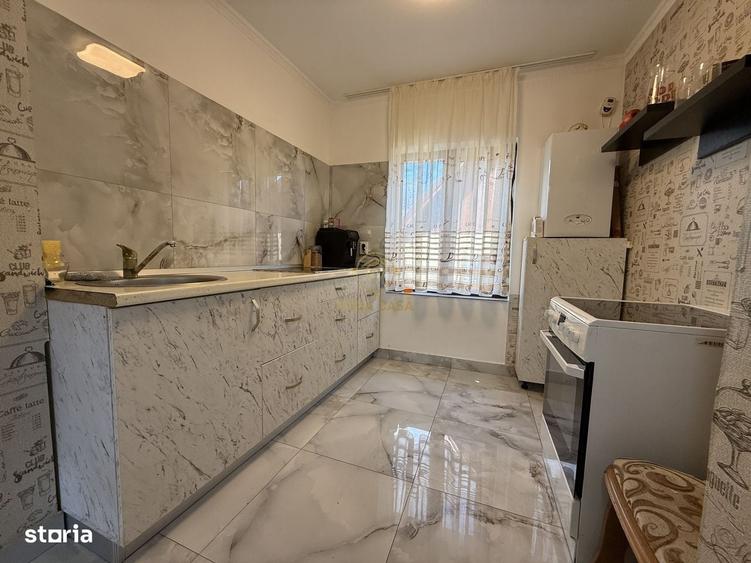 Casă cu 4 camere în Titulescu