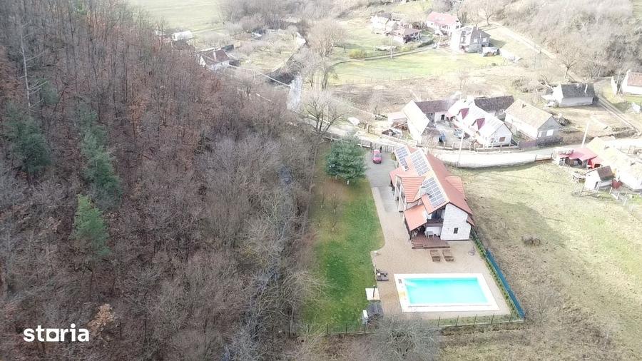 Casă cu 4 camere cu Teren 1625 Mp în Păuliș