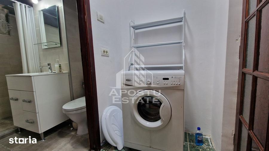 Apartament cu 2 camere semidecomandat, mobilat în Take Ionescu