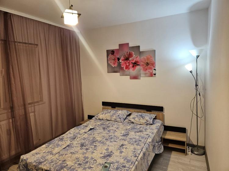 Apartament cu 2 camere semidecomandat, mobilat în Central