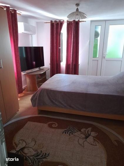 Casă cu 2 camere cu Teren 1800 Mp în Central